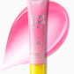 A pink tube of Supergoop Glow Gloss Lip Balm SPF 40 is shown with a swatch behind it on a white background, ideal for ultra-hydrated lips and a non-sticky finish.
