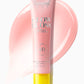 A pink tube of Supergoop Glow Gloss Lip Balm SPF 40 is displayed on a matching pink smear, offering ultra-hydrated lips and a non-sticky finish.