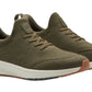 Introducing the Peter Millar Tellustride Sneaker: a stylish pair of olive green knit sneakers, highlighted with white soles and tan accents. Crafted by Peter Millar, these shoes feature a memory foam insole for extra comfort, displayed beautifully from a side angle.