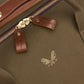 Close-up of a khaki Bennett Winch Canvas Weekender bag with full grain leather straps and a gold zipper. This waterproof canvas bag displays the brand name "Bennett Winch" along with a logo featuring two birds above the letters "B" and "W.