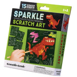 Crocodile Creek Sparkle Scratch Art activity set by Crocodile Creek, designed for kids ages 3-8, includes dinosaur-themed art with 15 scratch sheets and a small parts caution.