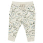 Explore the charm of the Angel Dear Artsy Dinos Joggers, featuring a delightful dinosaur print on a cream-colored background. Made from soft organic cotton, these joggers showcase various species in green and blue outlines, ensuring both comfort and style for your child.