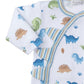 The Kissy Kissy Dinosaur Domain Playsuit, crafted from soft Pima cotton, features charming dinosaur prints in blue, green, and brown. It is adorned with striped accents and playful decorative fabric spikes along the side, adding a whimsical touch.