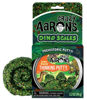 Crazy Aarons presents their Dino Scales Thinking Putty, showcasing a lively mix of green, orange, and brown non-toxic silicone putty with dinosaur-themed packaging. It's ideal for sensory integration and limitless creative enjoyment.