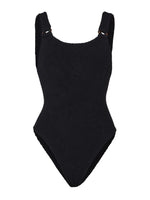 The Hunza G Domino Swim is a black crinkle fabric one-piece swimsuit with wide shoulder straps and a high-cut leg, shown on a white background.