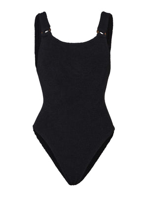 The Hunza G Domino Swim is a black crinkle fabric one-piece swimsuit with wide shoulder straps and a high-cut leg, shown on a white background.