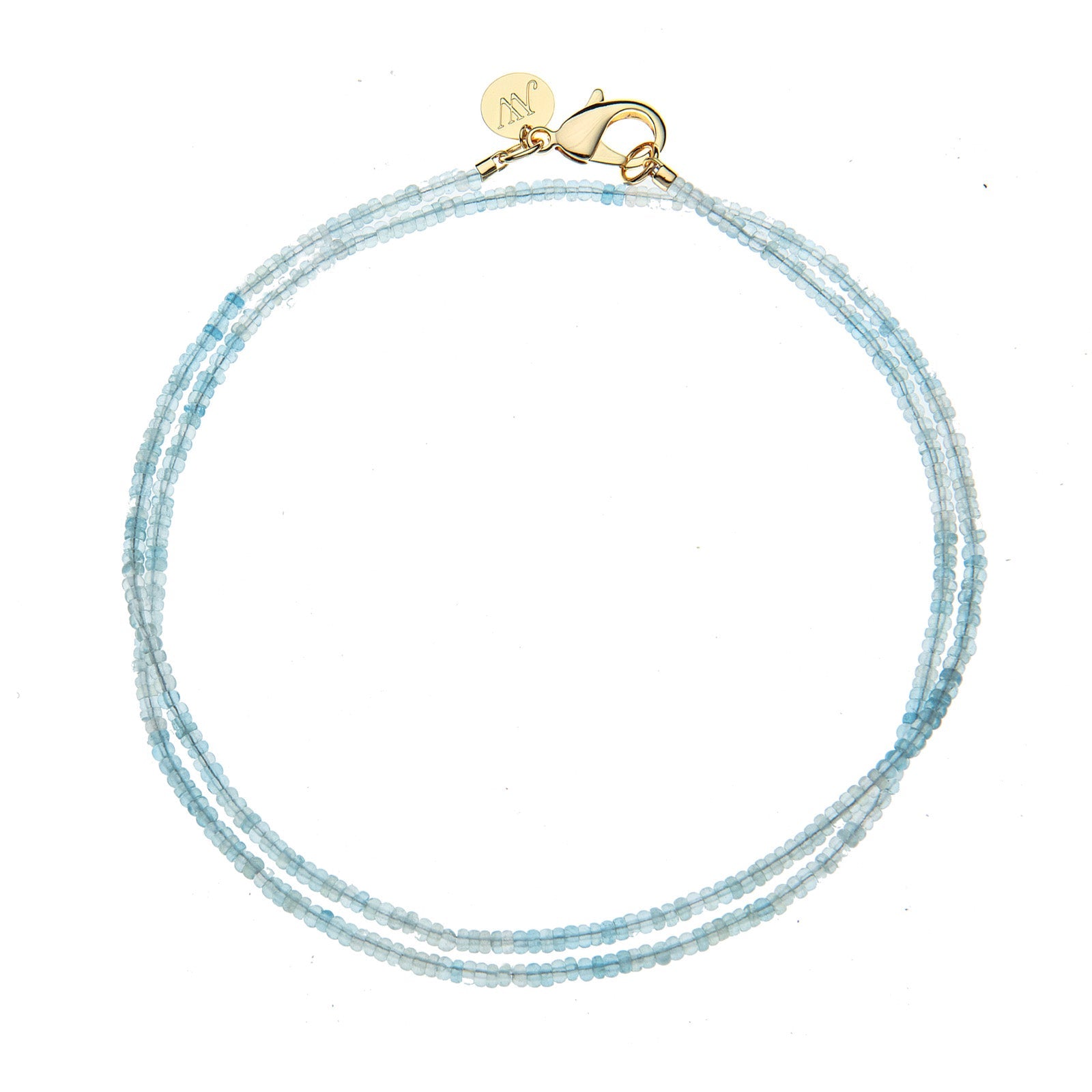 Introducing the Jane Win Double Wrap Beaded Necklace—a delicate, double-stranded light blue beaded piece featuring a gold clasp and a small round gold charm. Perfect for pairing with your favorite versatile necklace or Jane Win pendant.