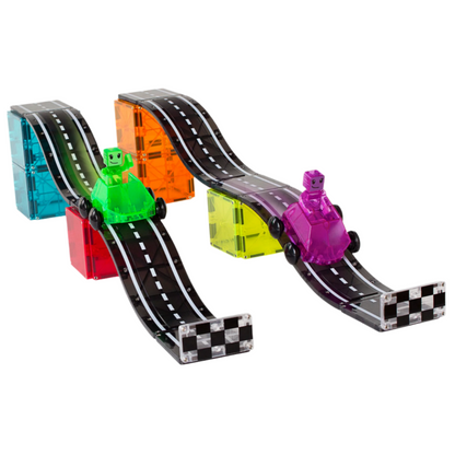 Two toy cars with blocky figures race on wavy, black tracks built with the Magnatiles Downhill Duo 40-Piece Set, sparking imagination as they speed toward checkered finish lines.