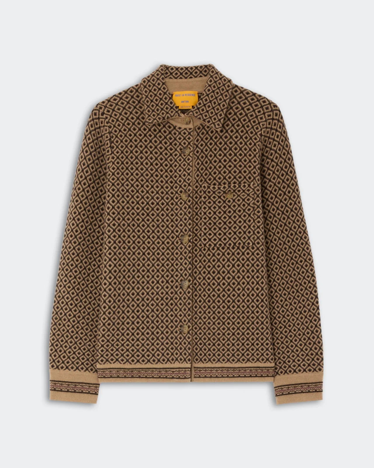 The Dylan Marquise Shirt by Guest in Residence is a brown, long-sleeve cashmere shirt featuring a geometric diamond pattern, front buttons, a chest pocket, and a collar in a relaxed fit, shown against a plain background.