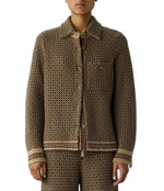 A person is wearing a matching set of patterned brown and beige jacket and pants, styled with the relaxed-fit Dylan Marquise Shirt by Guest in Residence, standing facing forward against a white background.