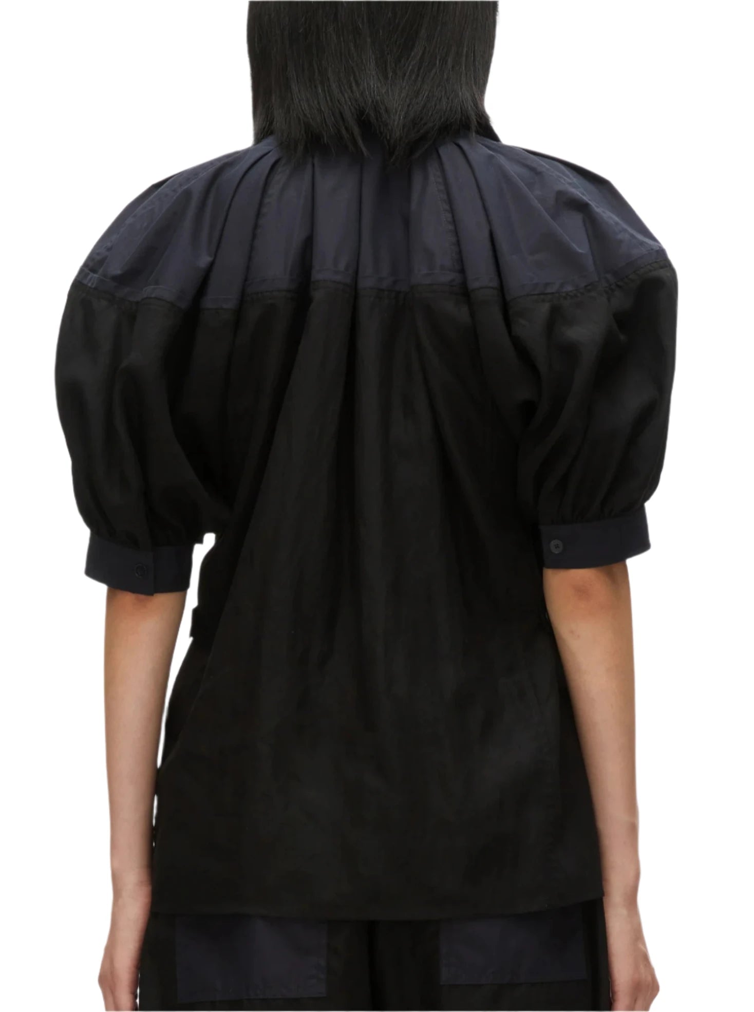 A person wearing the 3.1 Phillip Lim Lantern Sleeve Combo Shirt exudes feminine elegance, viewed from behind.