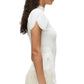 Clad in the 3.1 Phillip Lim Compact Rib Tulip Top, a white short-sleeve piece with a side tie detail, and a fringed skirt showcasing a subtle Tulip silhouette, an individual stands against a plain background.