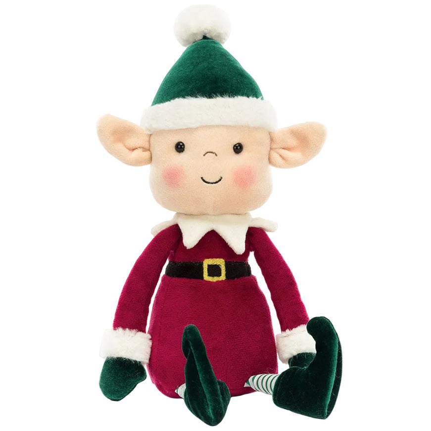 Jellycat Eldo Elf plush doll wearing a dark red tunic, green hat with a white pom-pom, and striped leggings, sitting upright.