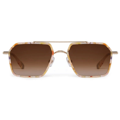 The Emery Sunglasses by Krewe feature a unisex rectangular frame with multicolored marbled design, brown gradient lenses, and gold metal bridge and arms—a lightweight accessory for everyday style.