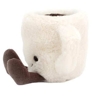 The Jellycat Amuseables Espresso Cup is a white plush with cute animal features, including a brown trunk-like handle and round black eyes.