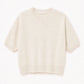 Cream-colored Sablyn Evie Sweater in a relaxed-fit cashmere knit with short sleeves, a crew neckline, and ribbed trim.