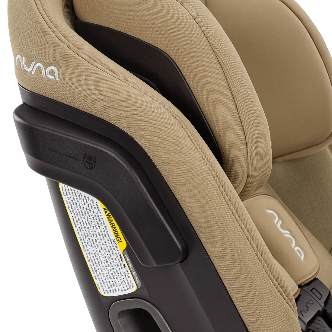 Close-up side view of a beige Nuna EXEC car seat with Slip Cover and 2nd Insert, prominently displaying the branding and a visible warning label. The seat also features an Aeroflex side impact protection system for enhanced safety.