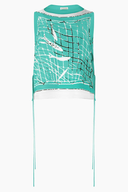 The Siggi Top by Altuzarra is a sleeveless teal and white silk piece featuring an abstract black and white graphic, wide neckline, side strings, and a loose fit.