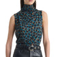 A woman wears the Altuzarra Holt Top, a relaxed sleeveless piece with a high draped neckline and teal and brown leopard print, styled with black belted leather pants for a straight silhouette.