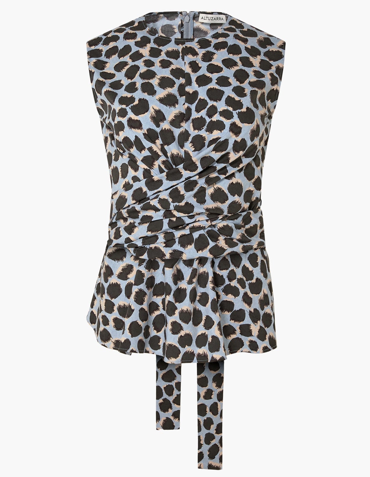 The Tizzy Top by Altuzarra is a sleeveless piece showcasing a blue, black, and beige leopard print. It features a round neckline, a cinched waist with belted detail, and long fabric ties at the front.