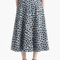A person shown from the back against a white background wears the Altuzarra Varda Skirt, an A-line midi skirt in blue and black leopard print, paired with black high-heeled sandals.