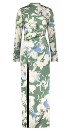 A Lela Rose Long Sleeve Draped Sheath Floral Satin Crepe Dress, adorned with white and blue floral print on green satin crepe and featuring a side slit.