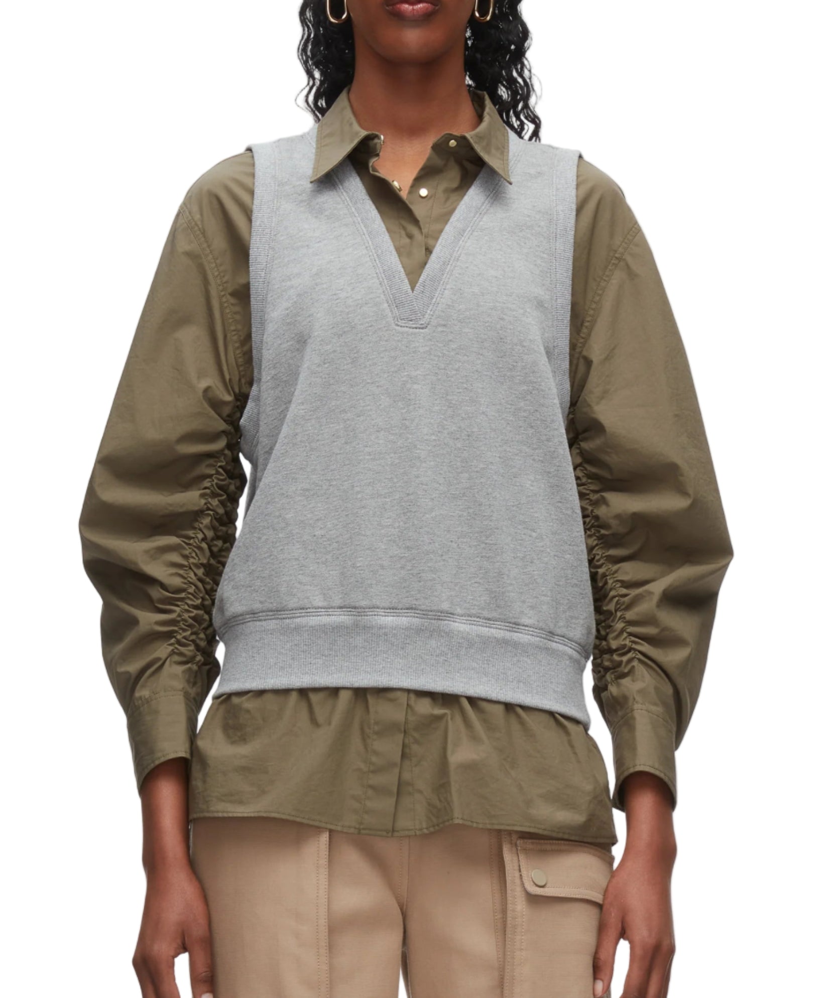 A person wears the 3.1 Phillip Lim Layered Vest Ruched Sleeve Shirt, styled with beige cargo pants.