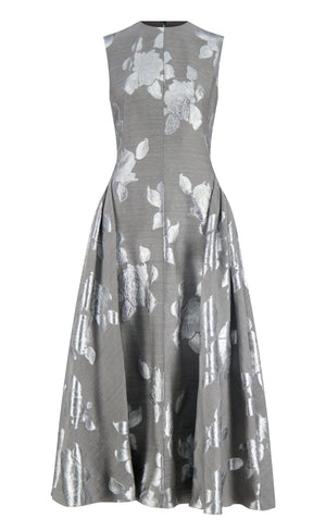 The Lela Rose Sleeveless A Line Floral Fil Coupe Dress features a metallic floral pattern, fitted bodice, and flared skirt. Displayed on a white background, it's perfect for special occasions.