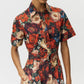 Person wearing the Leighton Dress by Adam Lippes, in Italian cotton poplin with a bold red, orange, and cream floral print and belted waist, against a plain background.