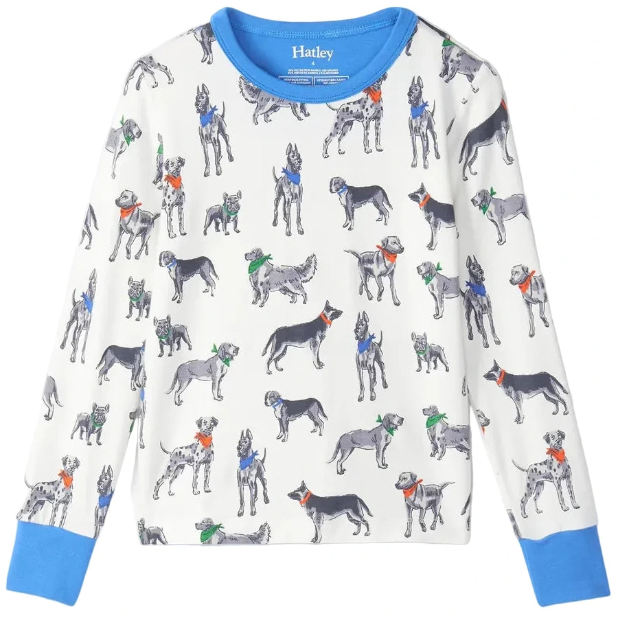 The Hatley Boys’ Bandana Dogs Bamboo Pajama Set features a white long-sleeve shirt with blue collar and cuffs, adorned with an all-over print of illustrated pups sporting colorful bandanas—an ideal choice for cozy kids’ sleepwear or charming dog-themed pajamas.