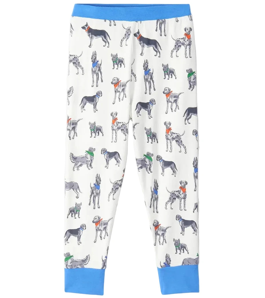 The Boys’ Bandana Dogs Bamboo Pajama Set by Hatley features white pajama pants with blue cuffs and a playful print of illustrated dogs wearing colorful scarves and collars, making these bamboo pajamas perfect for kids’ sleepwear.