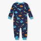 Hatley Baby Boys’ Colourful Dinos Cotton Rib Coverall features vibrant dinosaur prints on a navy blue background, with light blue cuffs at the sleeves and ankles. Shown from the back, this cozy footless sleeper is ideal for both bedtime and playtime.