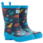 Hatley’s Boys’ Colourful Dinos Matte Rain Boots feature a blue rubber exterior with vibrant dinosaur silhouettes, waterproof construction, sturdy blue soles, and handy pull tabs—ideal for adventurous kids.