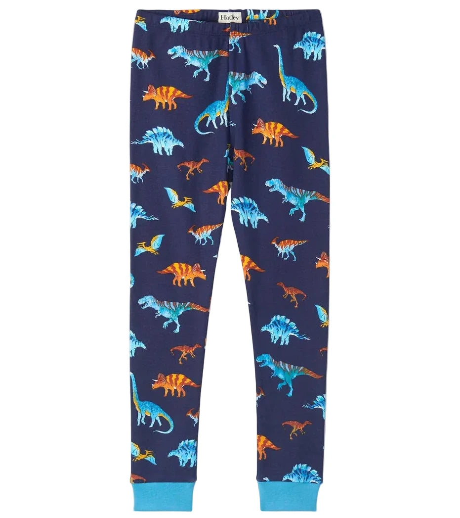 Hatley Boys’ Colourful Dinos Cotton Rib Pajama Set, featuring navy blue pajama pants with a vibrant dinosaur print and light blue cuffs, made from soft organic cotton kids sleepwear, laid flat on a white background.