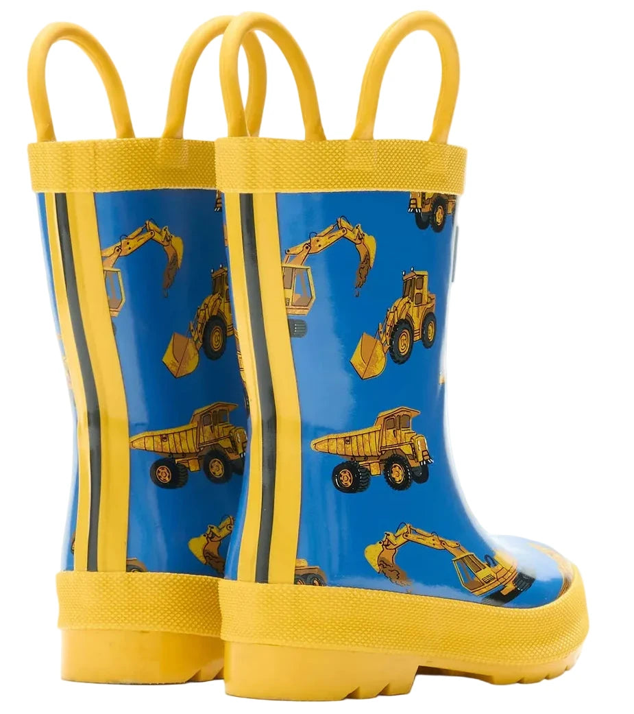 Hatley Construction Trucks Rain Boots with Handles feature a blue and yellow design and are decorated with fun images of excavators, dump trucks, and loaders. These waterproof rain boots are perfect for kids who love construction vehicles!.
