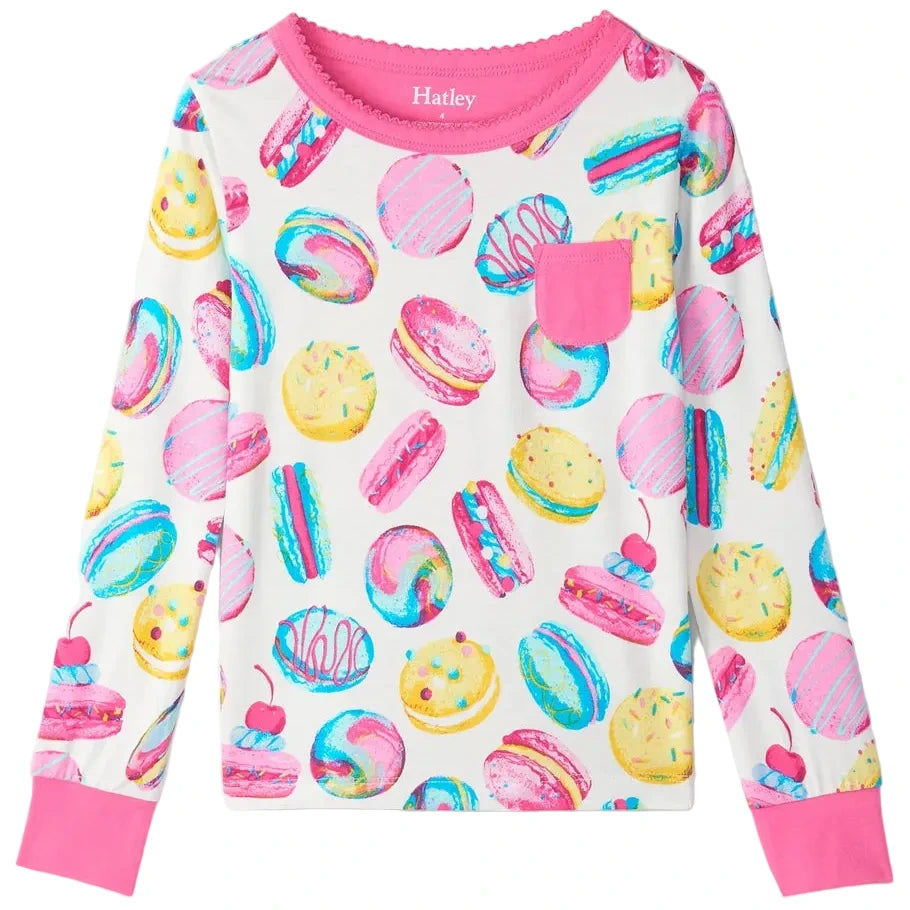 The Hatley Girls’ Macaron Bamboo Pajama Set is a cozy two-piece outfit made from soft bamboo jersey, featuring charming macaron prints, long sleeves with pink collar and cuffs, a small pink chest pocket, and the signature “Hatley” brand label at the neckline—perfect for bedtime comfort.