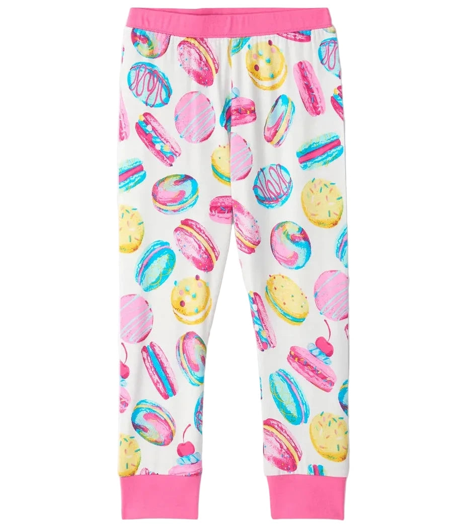 Hatley’s Girls’ Macaron Bamboo Pajama Set features soft bamboo jersey pajama pants adorned with a vibrant macaron print, finished with pink waistband and ankle cuffs—perfect for mixing and matching with your favorite cozy two-piece sleepwear.