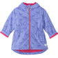 The Hatley Girls’ Pretty Bows Reveal Field Jacket is a charming periwinkle rain jacket featuring a playful bows print, soft pink lining, front zipper, hood, and a small white heart patch near the hem.