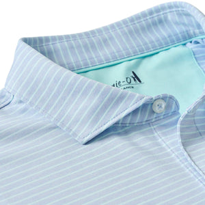 Close-up of the Johnnie-O Michael Polo, featuring a light blue color with thin white stripes, a contrasting light blue inner collar lining, and moisture-wicking fabric for all-day comfort.