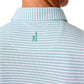 Close-up of the back of a person's neck and shoulders wearing the Johnnie-O Stetson Stripe Performance Mesh Polo in light blue and white stripes, featuring a small embroidered surfer and surfboard.