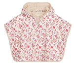 The Mael Beach Cape by Louise Misha features a floral pattern with red, pink, and purple flowers on a cream background, a beige lining, and a short collar—making this charming kids’ beach cape perfect for little ones to enjoy breezy days in style.