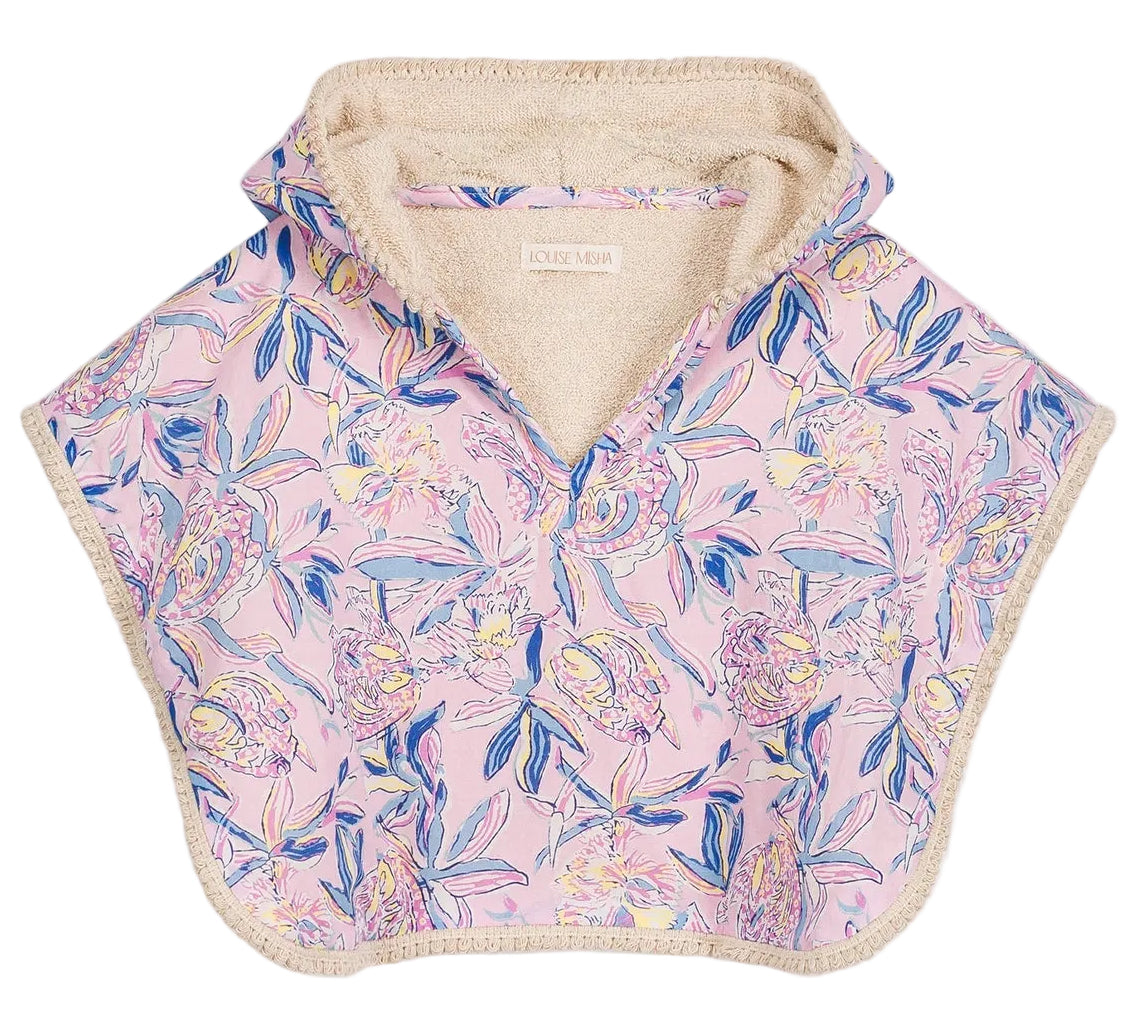 The Louise Misha Mael Beach Cape, featuring a pink, blue, and yellow floral pattern with a beige terry cloth lining, is shown laid flat.