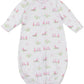 The Kissy Kissy Fairway Foursome Printed Convertible Gown is an adorable, ultra-soft Pima cotton infant sleeper featuring a pastel golfing pattern with golf bags, clubs, and flags. It converts into a gown for ultimate versatility.