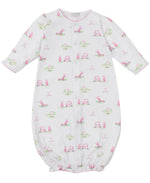 The Kissy Kissy Fairway Foursome Printed Convertible Gown is an adorable, ultra-soft Pima cotton infant sleeper featuring a pastel golfing pattern with golf bags, clubs, and flags. It converts into a gown for ultimate versatility.