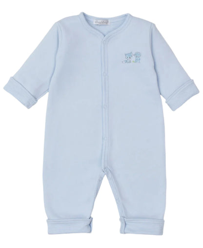 The Baby Forest Fun Reversible Playsuit by Kissy Kissy features long sleeves and front snap buttons, made from soft Pima cotton in light blue, and adorned with charming forest animal embroidery on the chest.