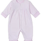 The Baby Forest Fun Reversible Playsuit by Kissy Kissy is a light pink infant playsuit made from soft Pima cotton, featuring long sleeves and front snap buttons, ideal for cozy days.