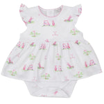 The Kissy Kissy Fairway Foursome Bodysuit Dress, made of soft Pima cotton, offers ultimate comfort with a charming golf-themed print in pink and green accents. This adorable white outfit includes a skirt and flutter sleeves adorned with delightful golf carts and flags.