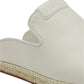 Lanvin's Domra Leather Espadrilles feature a white slip-on design with a leather upper and an espadrille-style woven sole, ideal for a chic summer look.