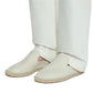 Someone sporting a chic summer look with Lanvin's Domra Leather Espadrilles featuring espadrille soles, perfectly paired with white pants for an effortless vibe.