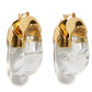 The Lizzie Fortunato Organic Gold Hoops are chunky resin earrings with gold-toned tops and translucent clear lower sections.
